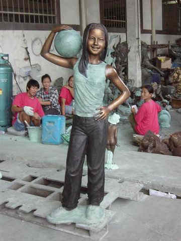 Bronze Girl Playing Soccer Bronze Girl Playing Soccer