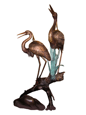 Bronze Cranes on a Log Bronze Cranes on a Log