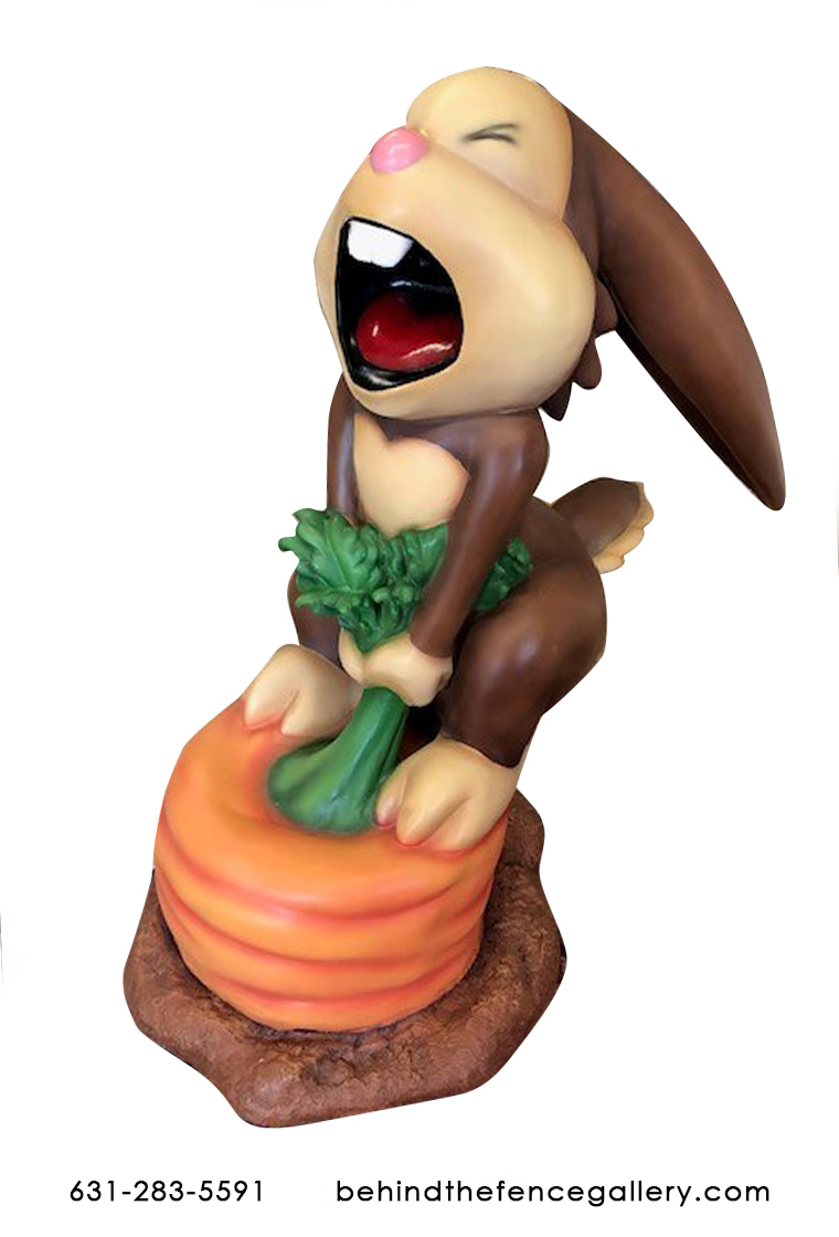 Cartoon Rabbit on Carrot Statue Cartoon Rabbit on Carrot Statue