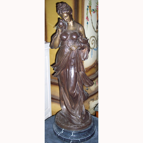 Bronze Lady with Bird Bronze Lady with Bird